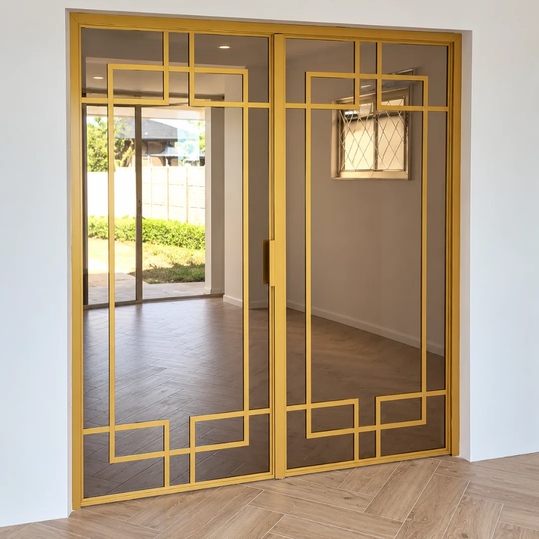 Gold double loft doors with geometric decorative bars